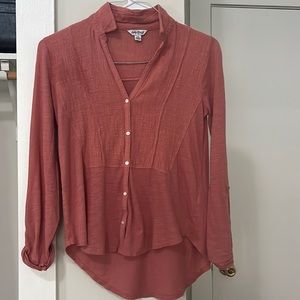 Pink button up top